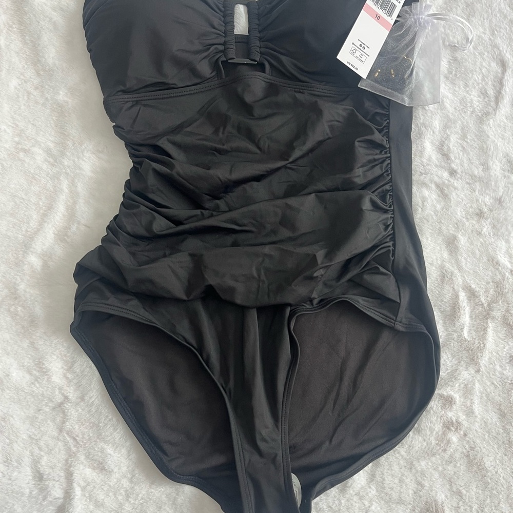 Black Ruched One-Piece Swimsuit by Anne Cole.